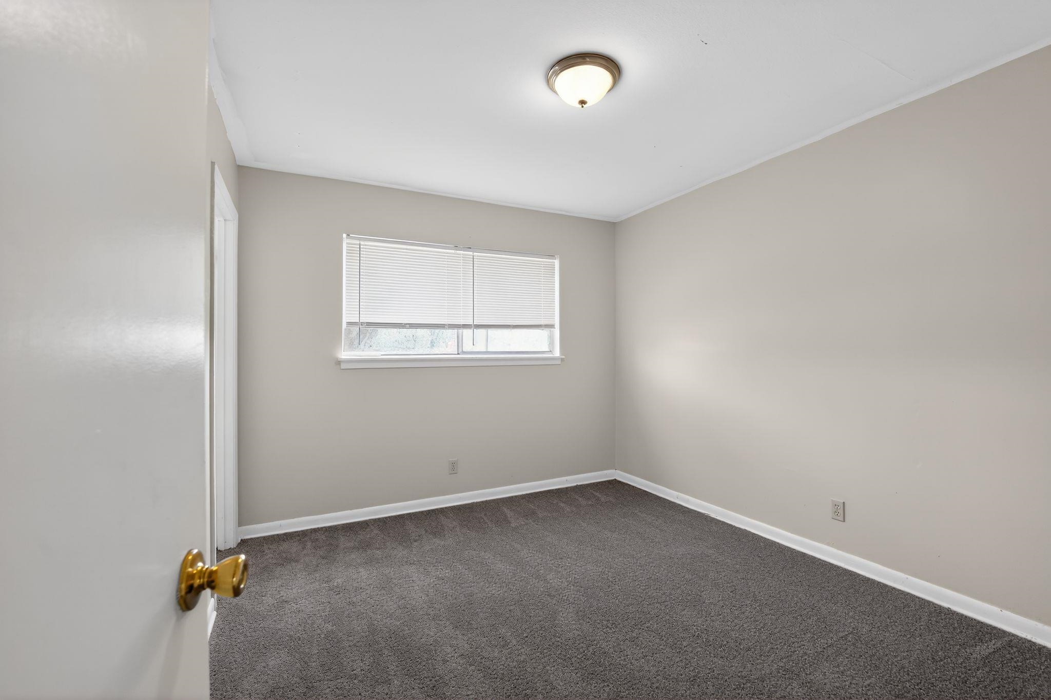 3470 Neely Road Memphis, TN 38109 - Photo 15 of 34 an empty room with a window