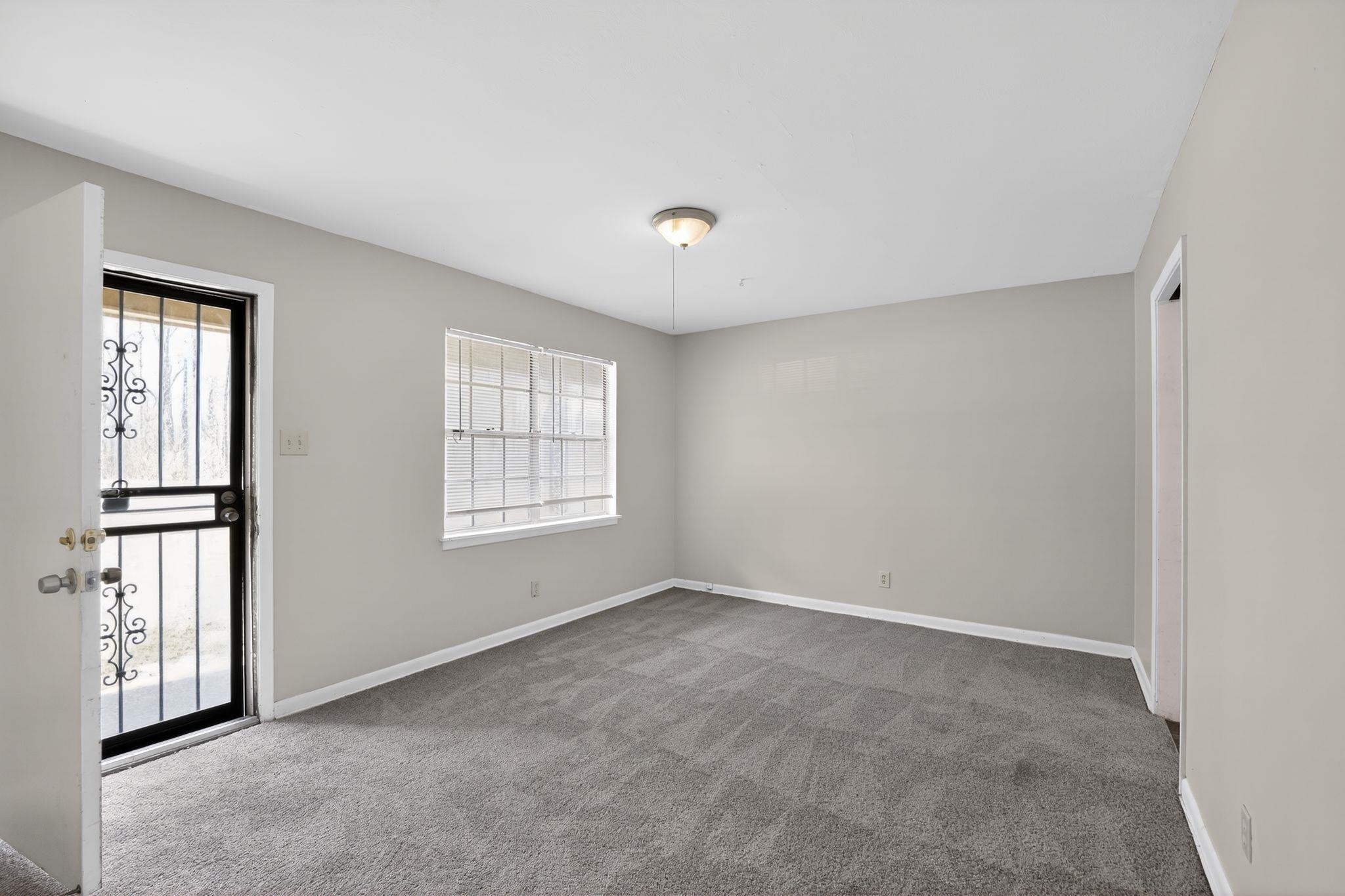 3470 Neely Road Memphis, TN 38109 - Photo 16 of 34 a view of an empty room with a window