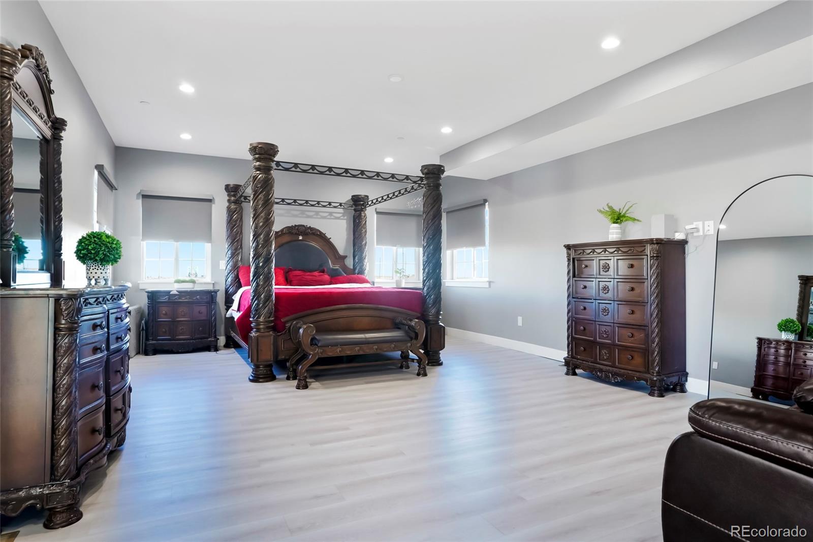 3161 Xmore Road Byers, CO 80103 - Photo 16 of 46 a bedroom with furniture and a bed