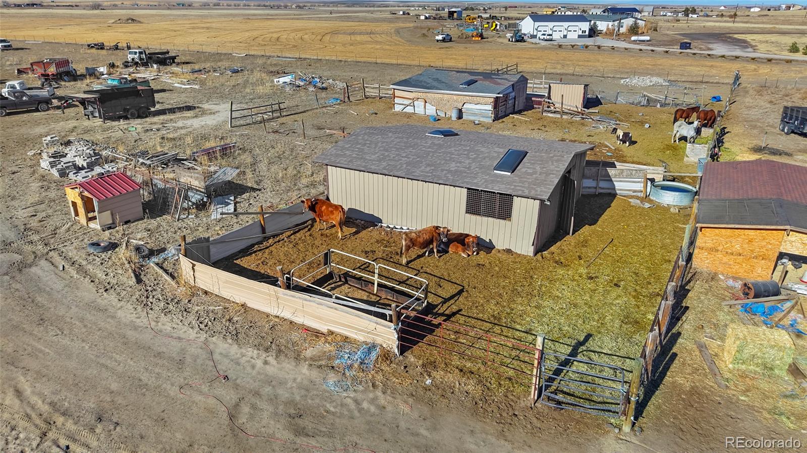 3161 Xmore Road Byers, CO 80103 - Photo 41 of 46 an aerial view of residential houses with outdoor space