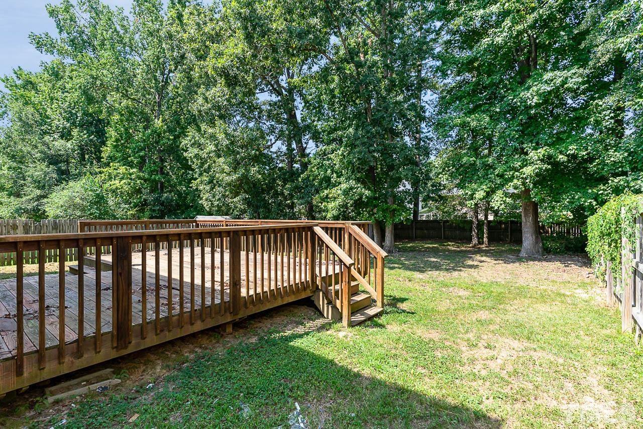 2904 Hayling Drive Raleigh, NC 27610 - Photo 4 of 24 a view of backyard with a small cabin