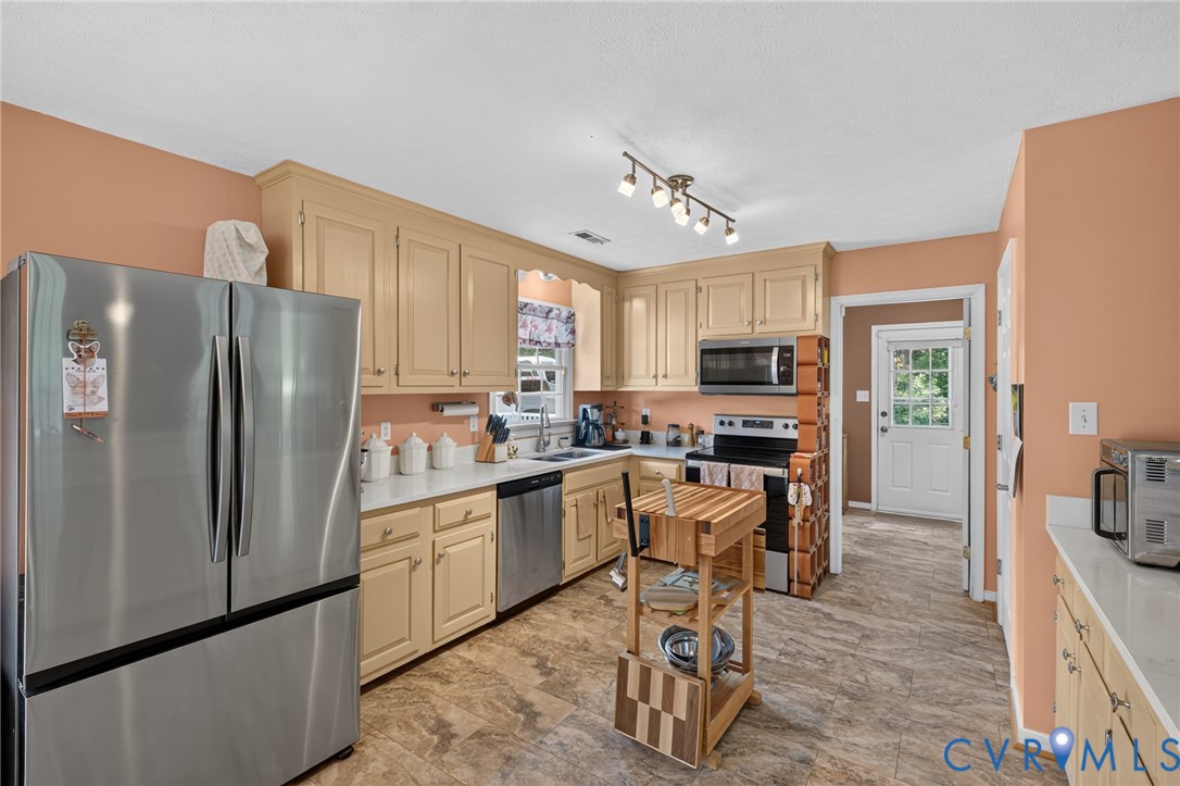2335 Dorrell Road Aylett, VA 23009 - Photo 7 of 26 Kitchen featuring stainless steel appliances, ligh