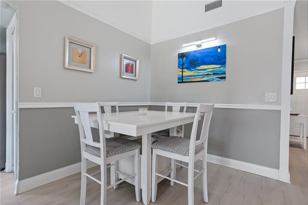 7550 Herricks Loop Orlando, FL 32835 - Photo 14 of 37 a view of a dining room with furniture