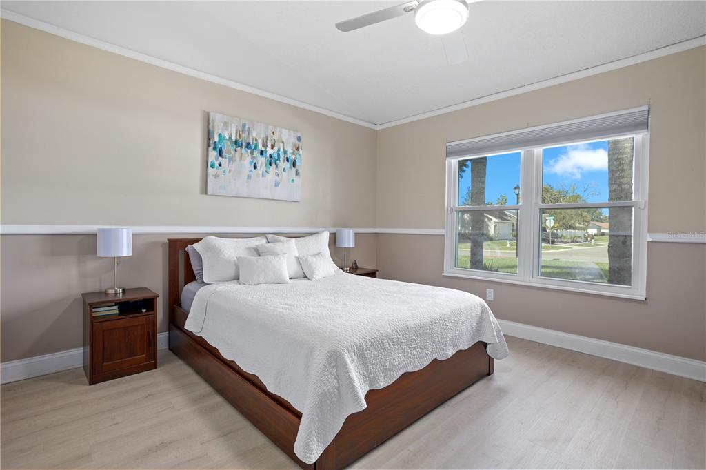 7550 Herricks Loop Orlando, FL 32835 - Photo 15 of 37 a bedroom with bed and a window