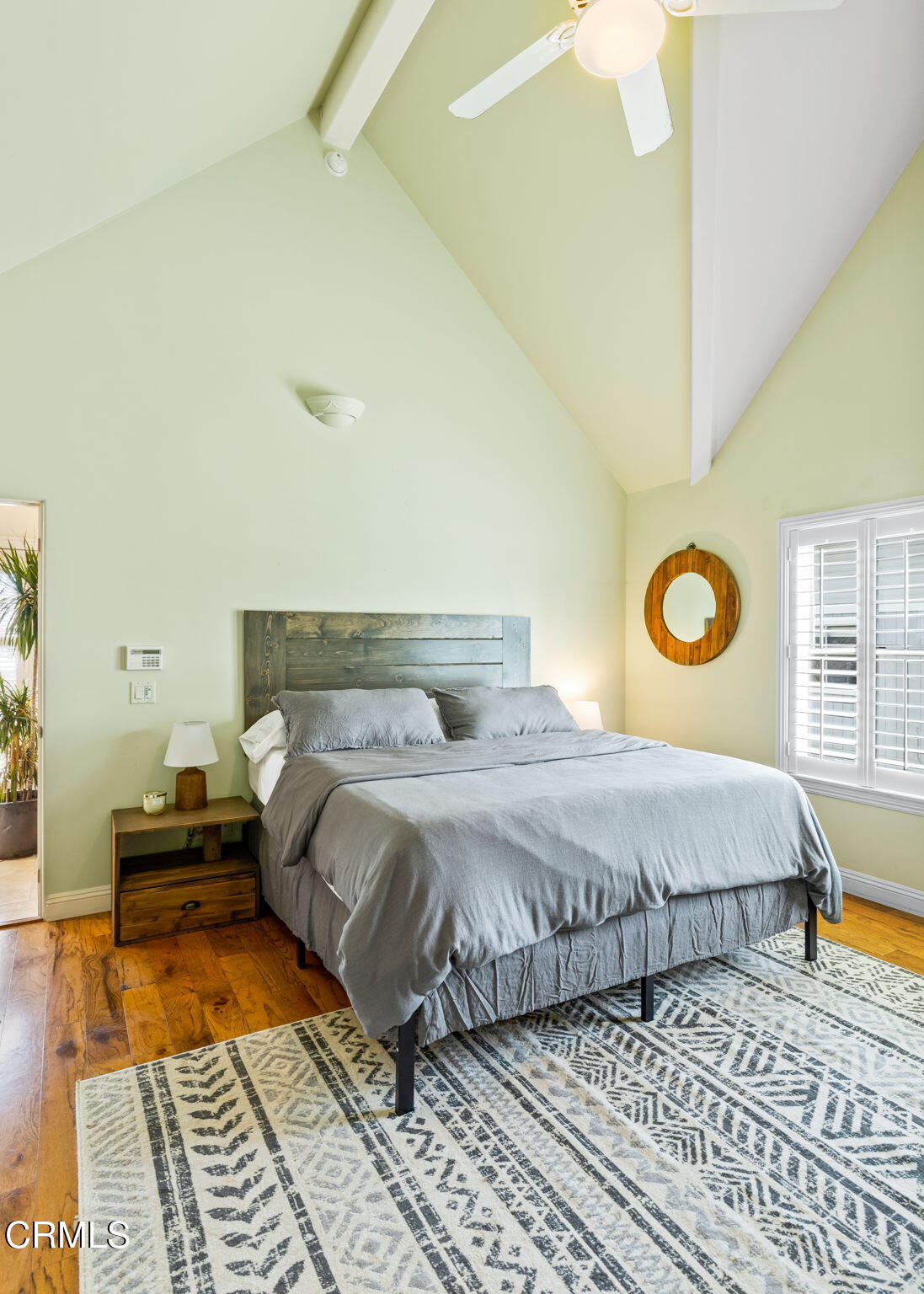 1206 Sagamore Lane Ventura, CA 93001 - Photo 11 of 19 a bedroom with a bed and wooden floor