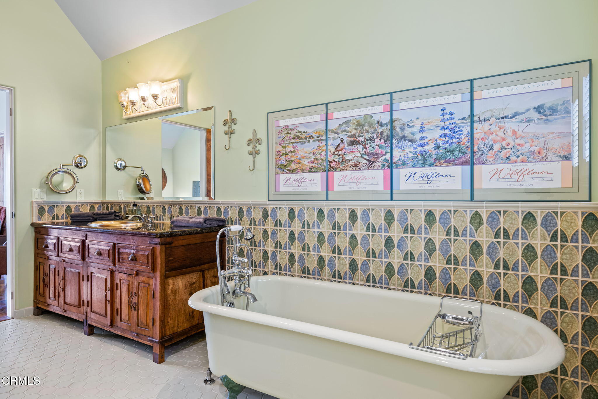 1206 Sagamore Lane Ventura, CA 93001 - Photo 12 of 19 a bathroom with a bathtub a mirror and a sink