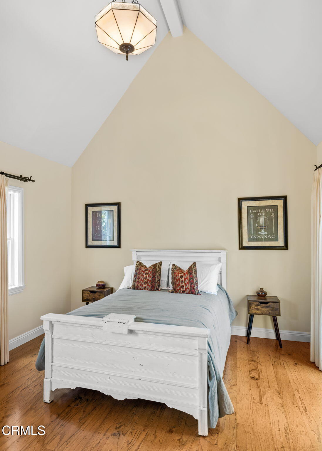 1206 Sagamore Lane Ventura, CA 93001 - Photo 7 of 19 a bedroom with a bed and a table