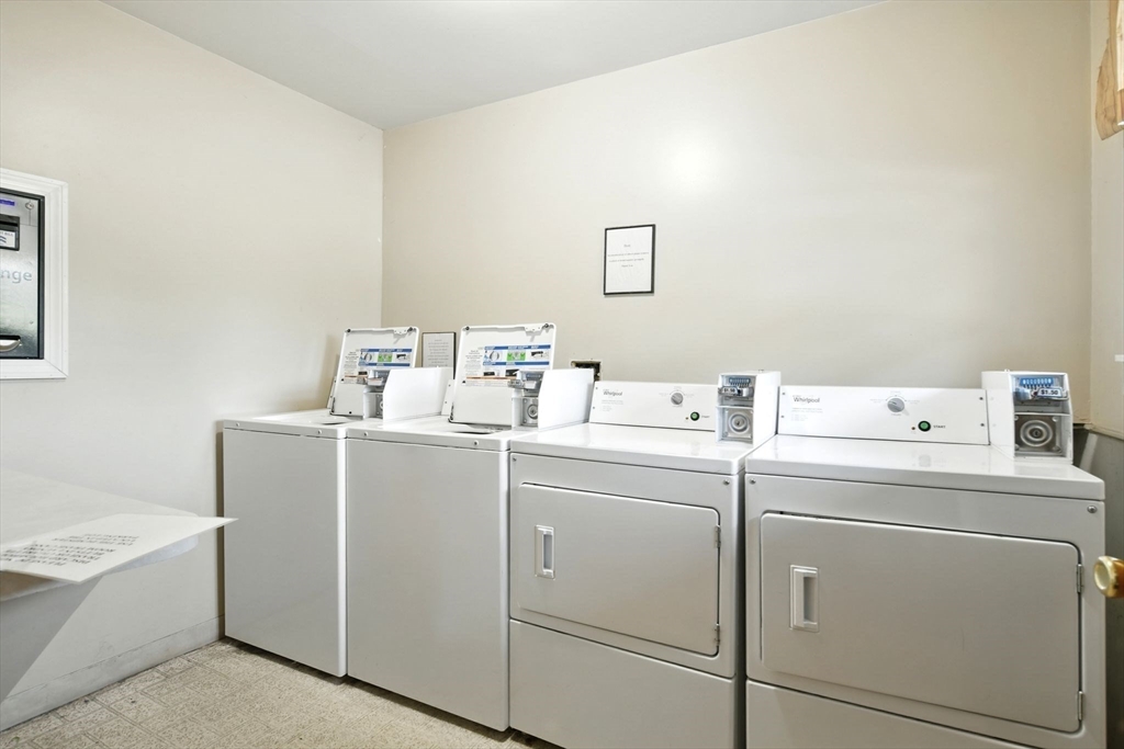 11 Conway Street Greenfield, MA 01301 - Photo 21 of 25 a utility room with dryer and washer