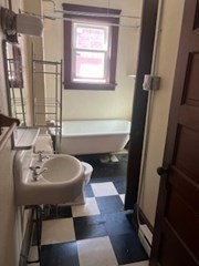 11 Conway Street Greenfield, MA 01301 - Photo 7 of 25 a bathroom with a sink and a mirror