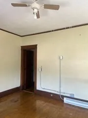 a kitchen with a stove a sink and a refrigerator