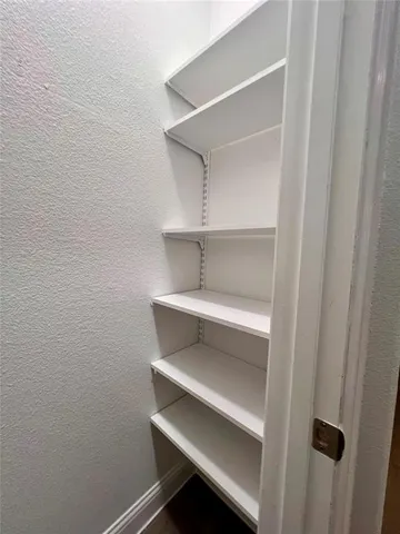 a storage room with empty racks