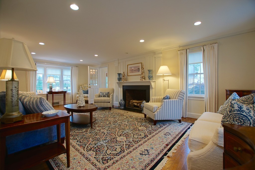 11 Shetland Road Marblehead, MA 01945 - Photo 8 of 28 a living room with furniture and a fireplace