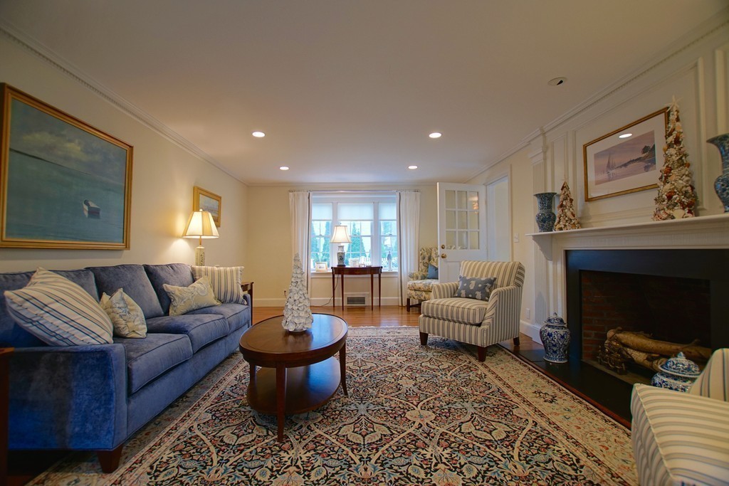 11 Shetland Road Marblehead, MA 01945 - Photo 9 of 28 a living room with furniture and a fireplace