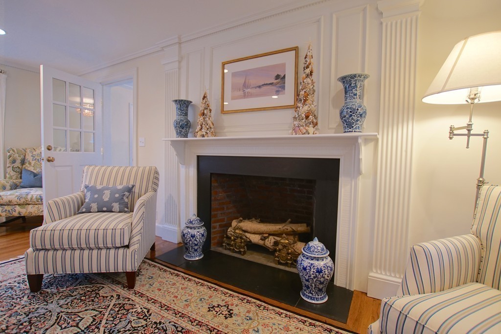 11 Shetland Road Marblehead, MA 01945 - Photo 10 of 28 a living room with furniture and a fireplace