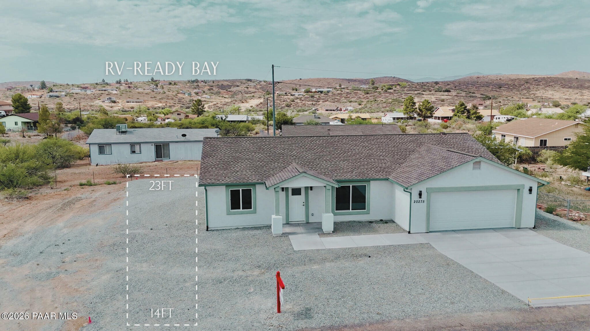 a house view with a garden space