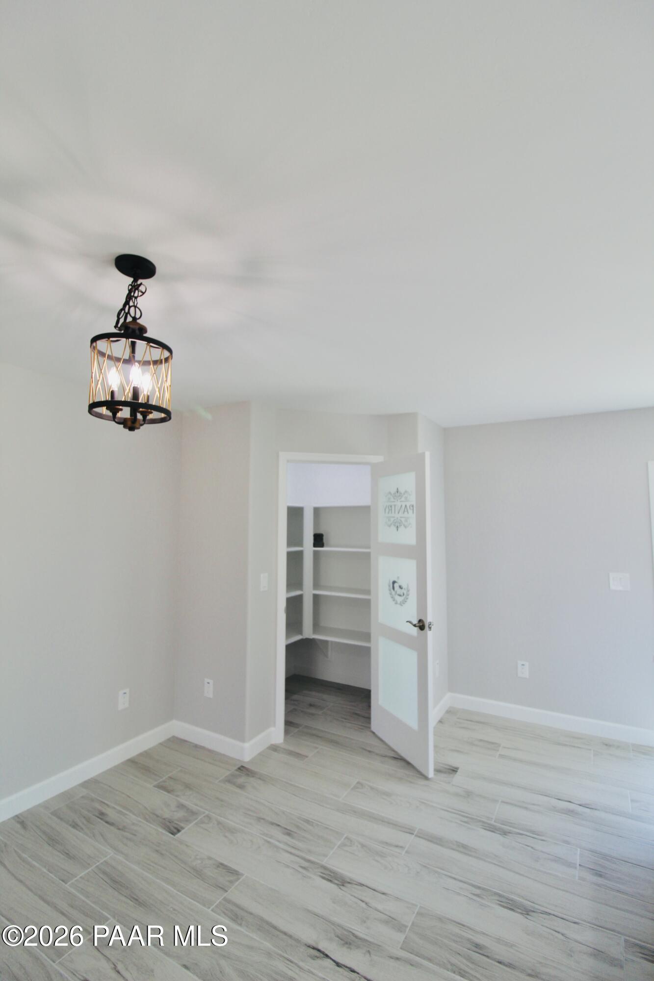 20275 East Mesa Verde Road Mayer, AZ 86333 - Photo 11 of 34 wooden floor in an empty room