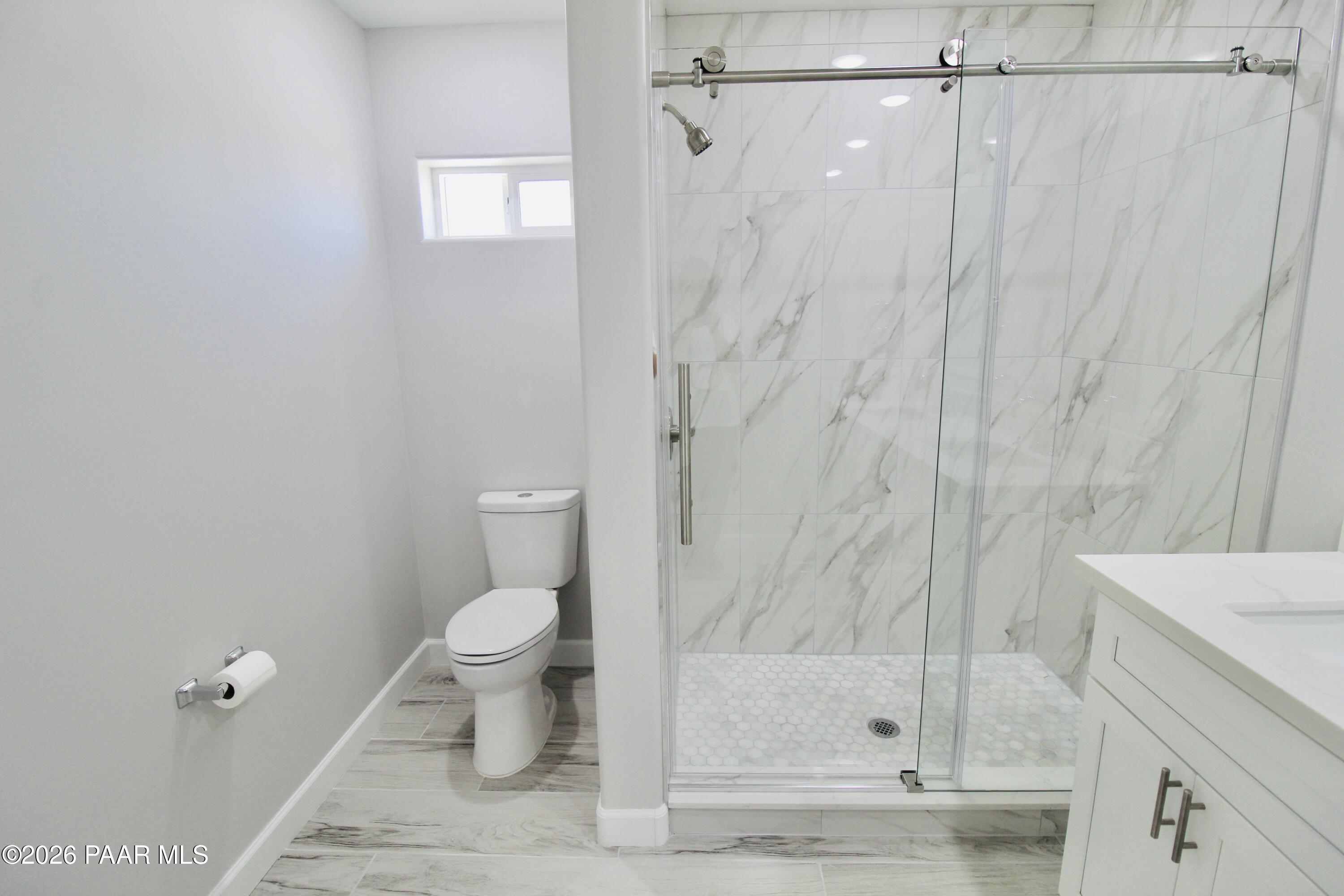 20275 East Mesa Verde Road Mayer, AZ 86333 - Photo 24 of 34 a bathroom with a sink and a toilet