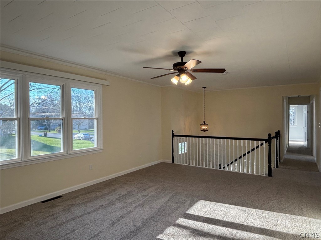 126 Jay Street Sullivan, NY 13037 - Photo 9 of 38 Living room. Notice the triple windows. Carpet i