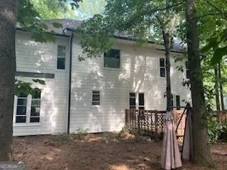 a front view of a house with yard