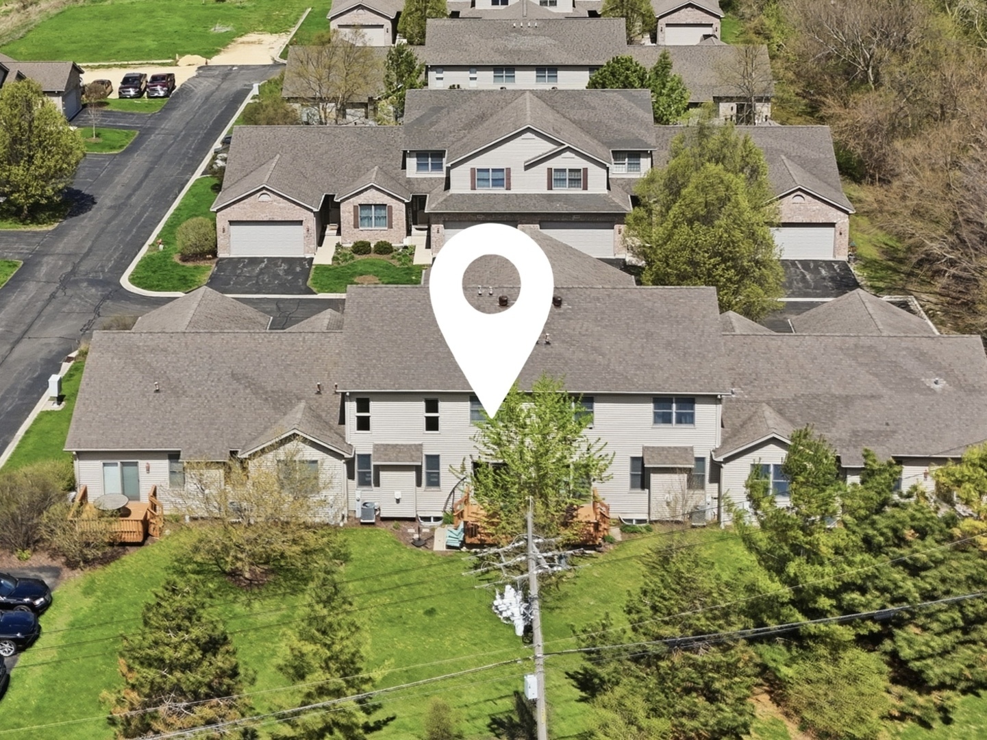 1462 Ridge Drive Sycamore, IL 60178 - Photo 25 of 32 an aerial view of a house with garden space and street view