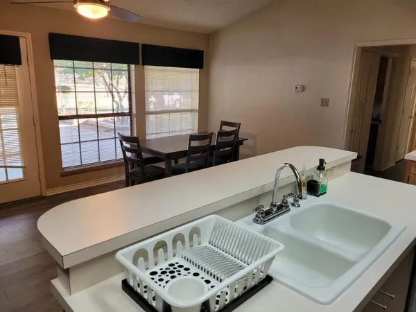 a view of a living room and dining room