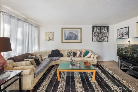 a living room with furniture and a couch