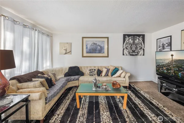 a living room with furniture and a couch