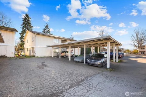 a view of a car in front of house