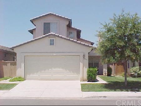 39543 June Road Temecula, CA 92591 - Photo 1 of 1 a front view of a house with a yard and garage