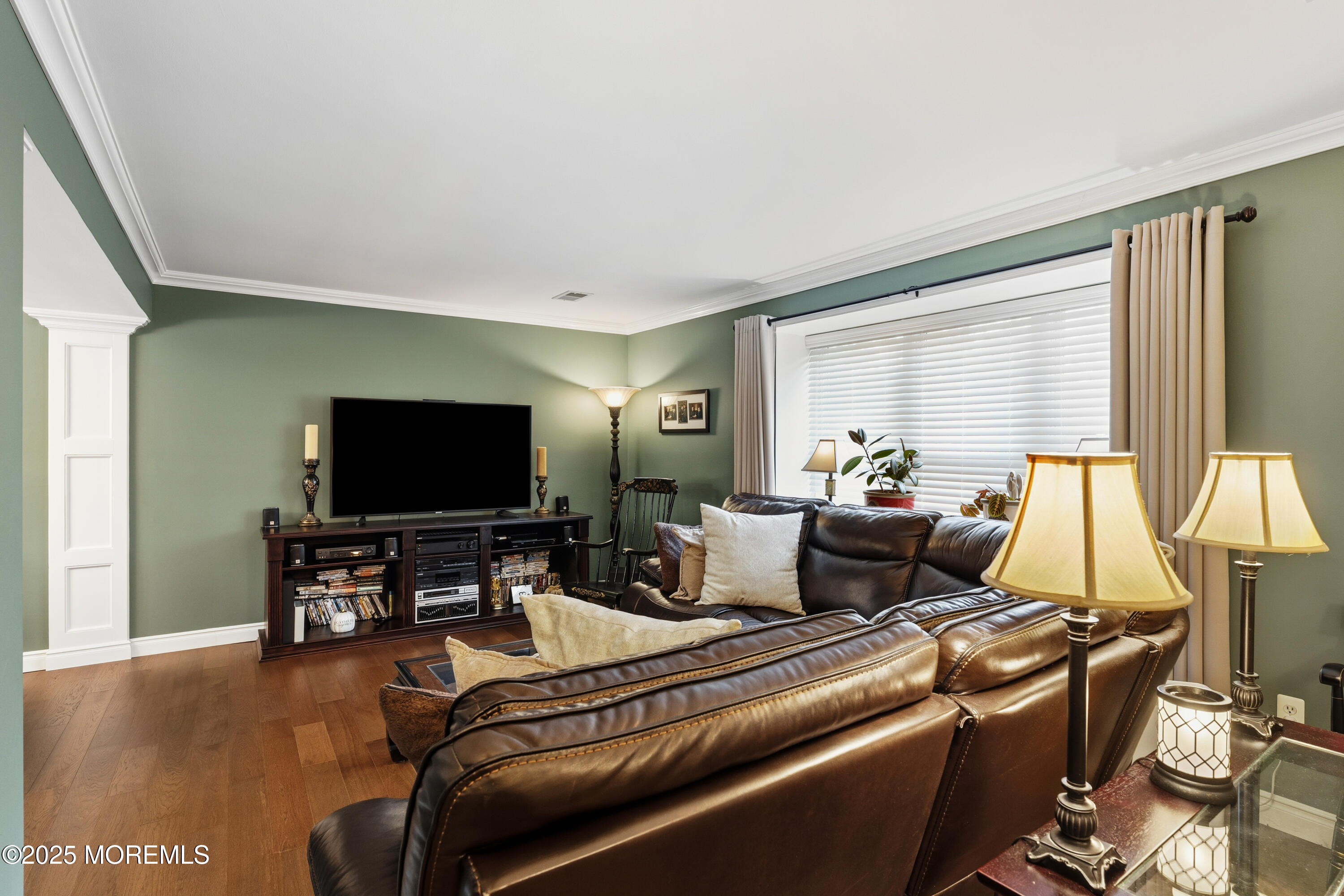 262 Frank Applegate Road Jackson, NJ 08527 - Photo 12 of 37 a living room with furniture and a flat screen tv