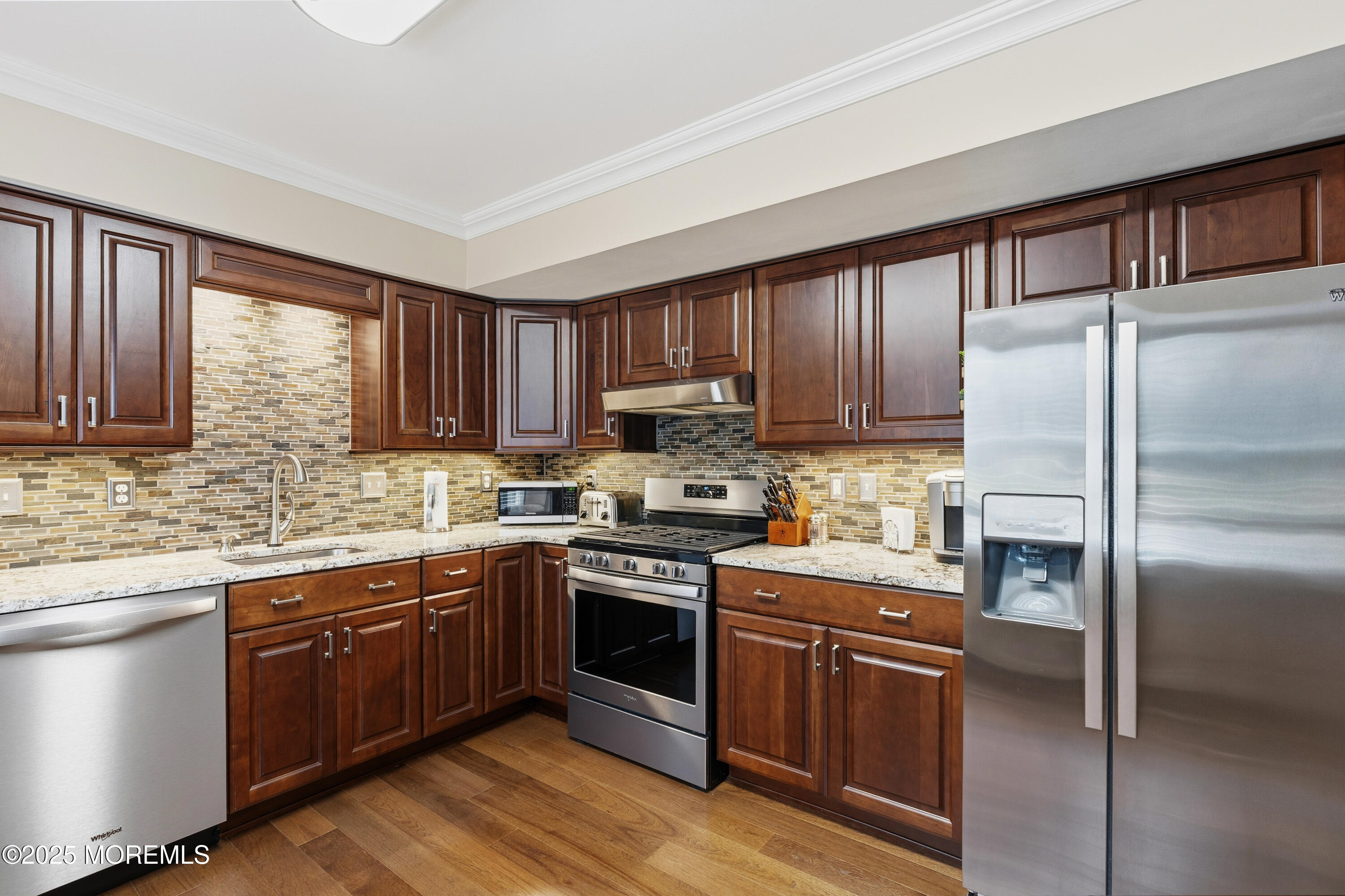 262 Frank Applegate Road Jackson, NJ 08527 - Photo 2 of 37 a kitchen with a sink stove and refrigerator