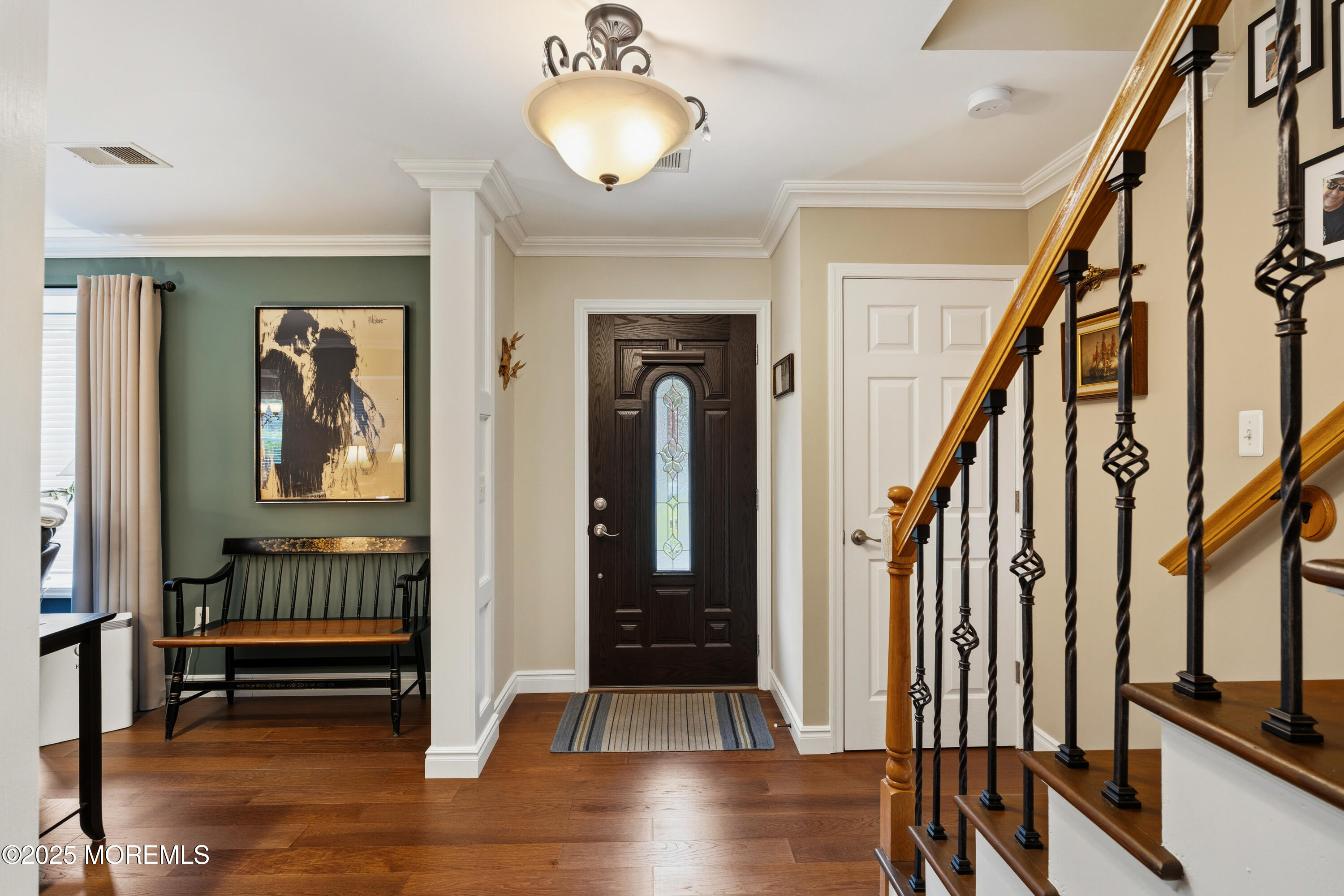 262 Frank Applegate Road Jackson, NJ 08527 - Photo 8 of 37 a view of hallway with stairs and wooden floor