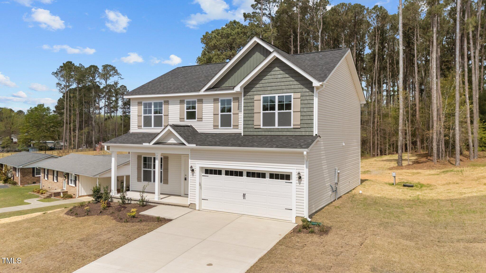 78 Bennett Road Coats, NC 27521 - Photo 2 of 39 2-web-or-mls-DJI_20250404132846_0212_D