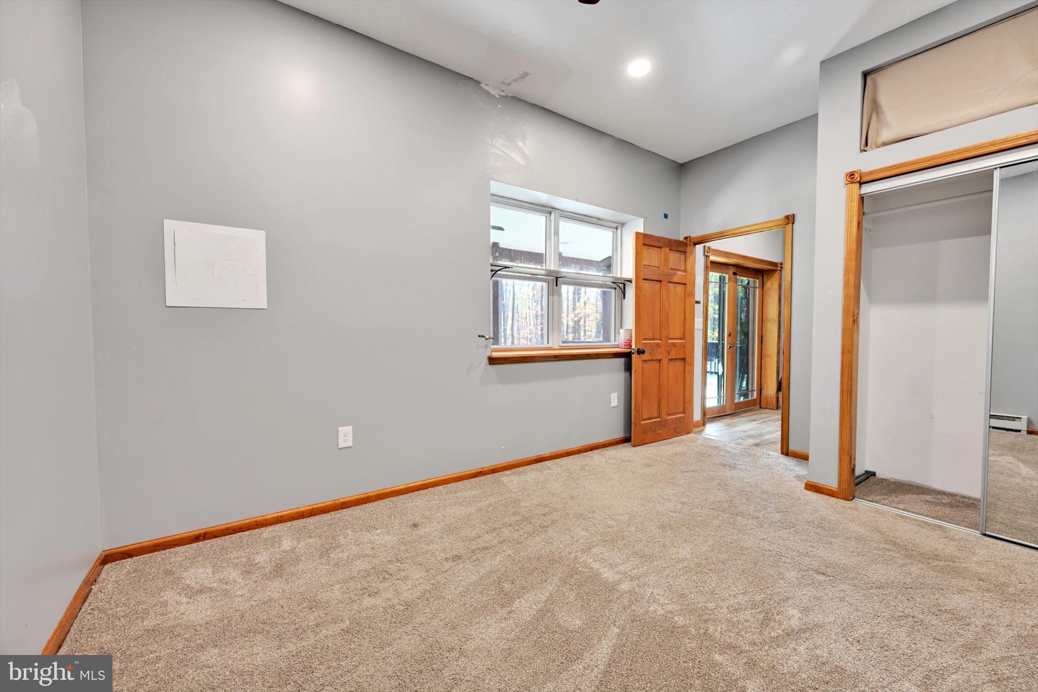 309 Club Road Bethel, PA 19507 - Photo 29 of 49 an empty room with windows