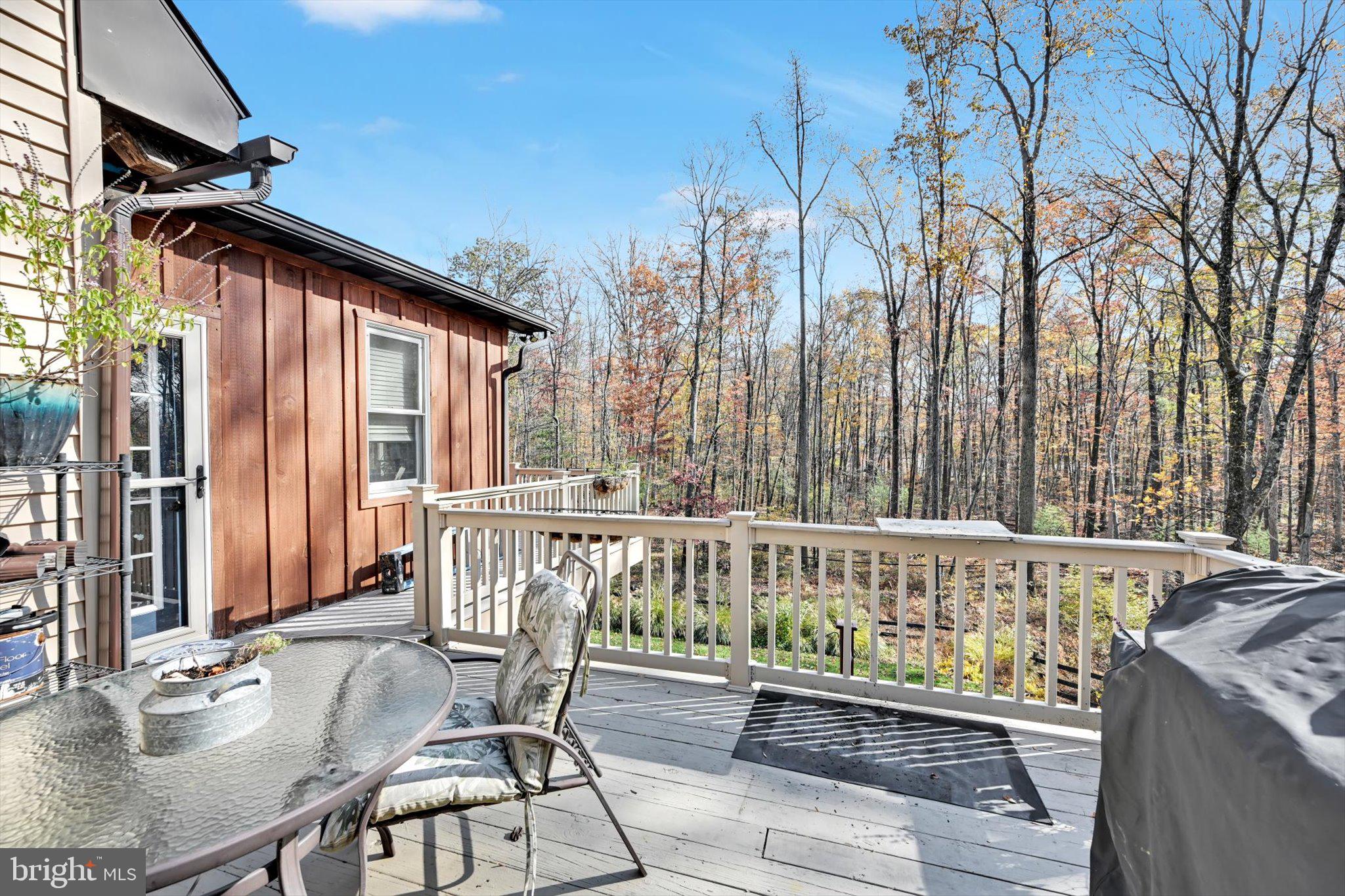 309 Club Road Bethel, PA 19507 - Photo 31 of 49 a view of a chair and tables in the balcony