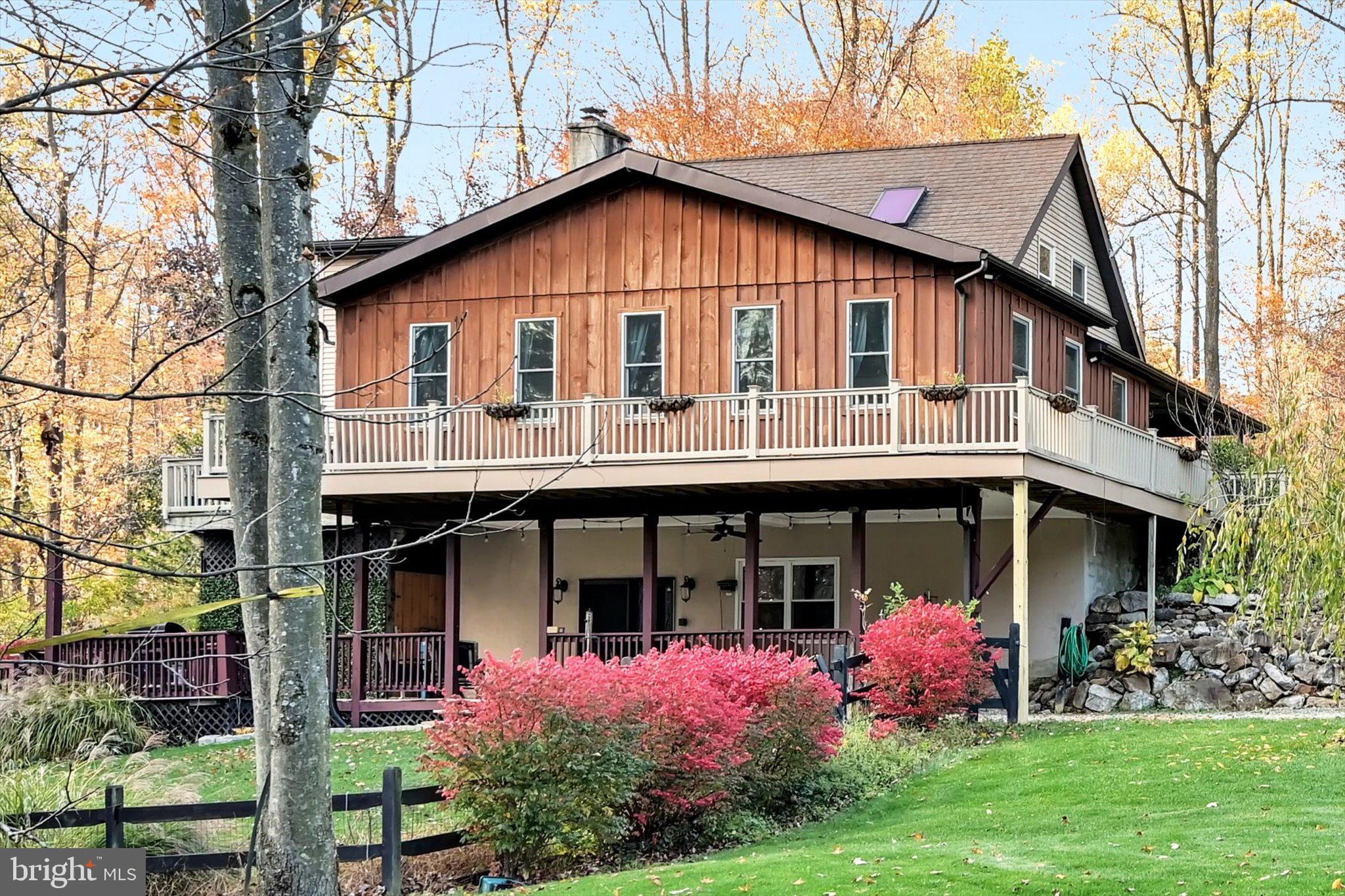 309 Club Road Bethel, PA 19507 - Photo 46 of 49 a front view of a house with garden