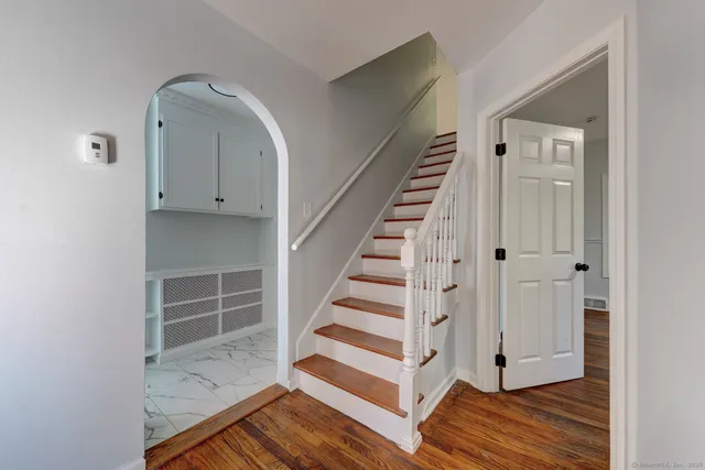 a view of entryway with wooden floor