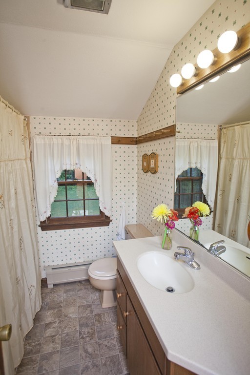 573 Westhampton Road Northampton, MA 01062 - Photo 25 of 30 a bathroom with a sink a toilet and shower
