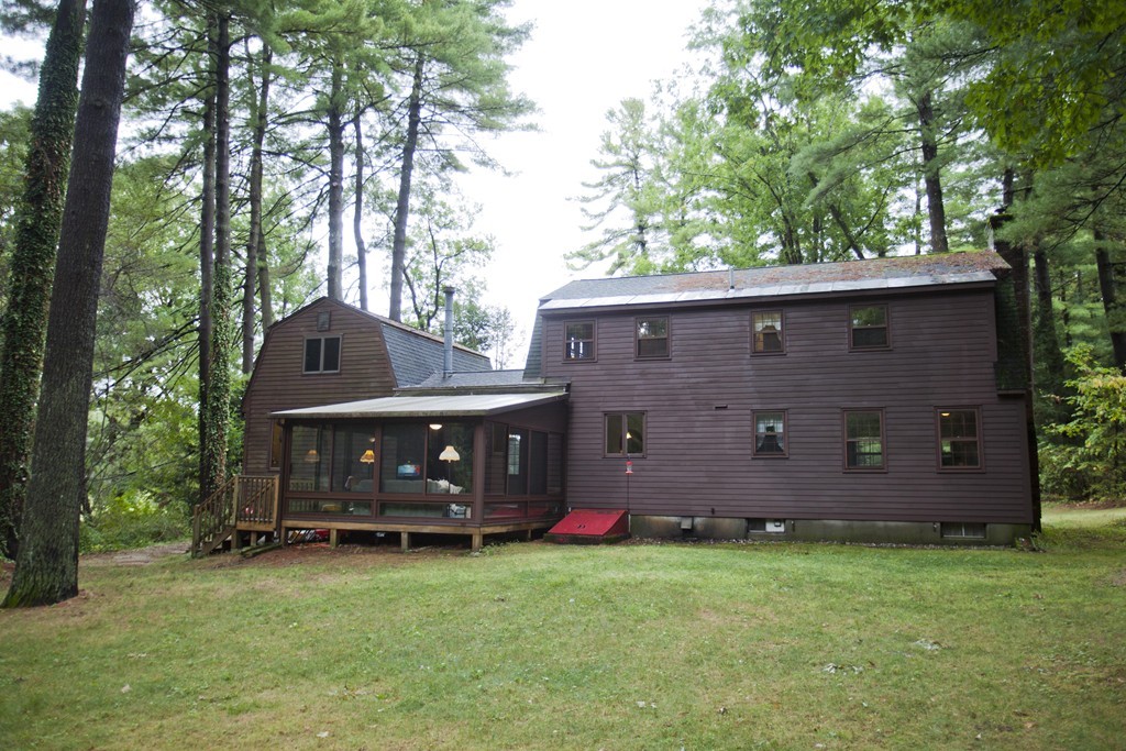 573 Westhampton Road Northampton, MA 01062 - Photo 3 of 30 a view of a house with a yard and sitting area