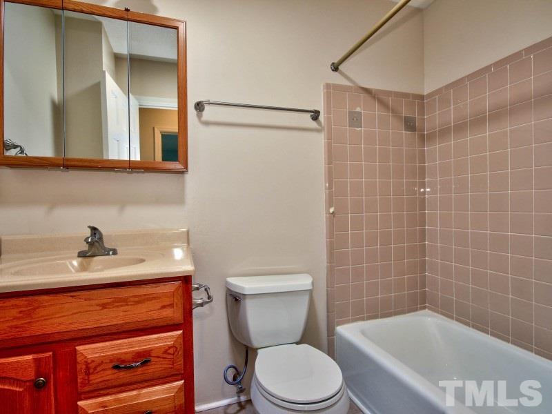 509 Old Farm Road Raleigh, NC 27606 - Photo 13 of 22 Master suite has an en suite bath for privacy and convenience.