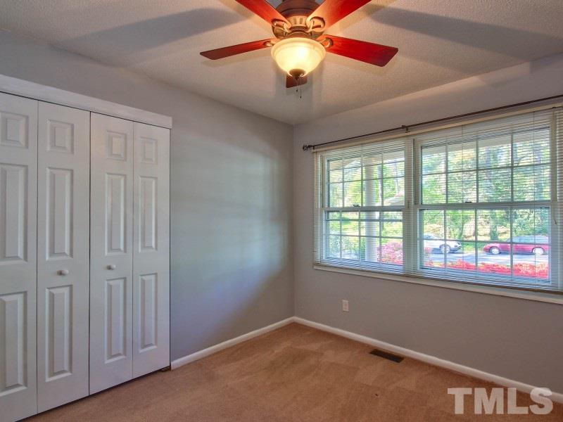 509 Old Farm Road Raleigh, NC 27606 - Photo 14 of 22 Additional bedrooms feature carpet, new paint, and great windows!
