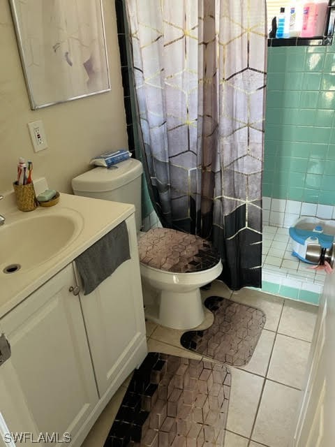 3049 2nd Street Fort Myers, FL 33916 - Photo 5 of 12 a bathroom with a sink toilet and shower