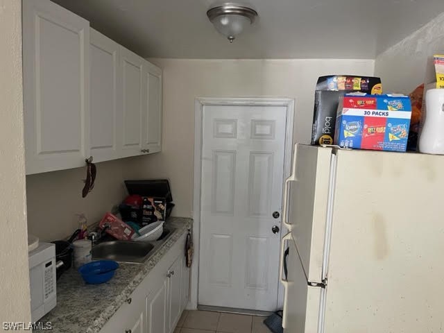 3049 2nd Street Fort Myers, FL 33916 - Photo 7 of 12 a room with storage and utility