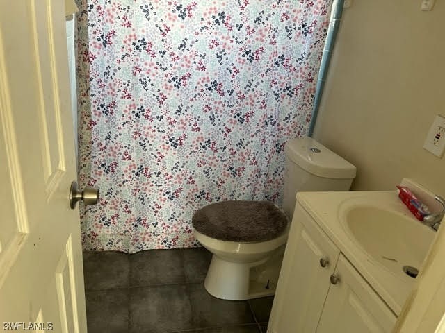 3049 2nd Street Fort Myers, FL 33916 - Photo 9 of 12 a bathroom with a toilet and a sink