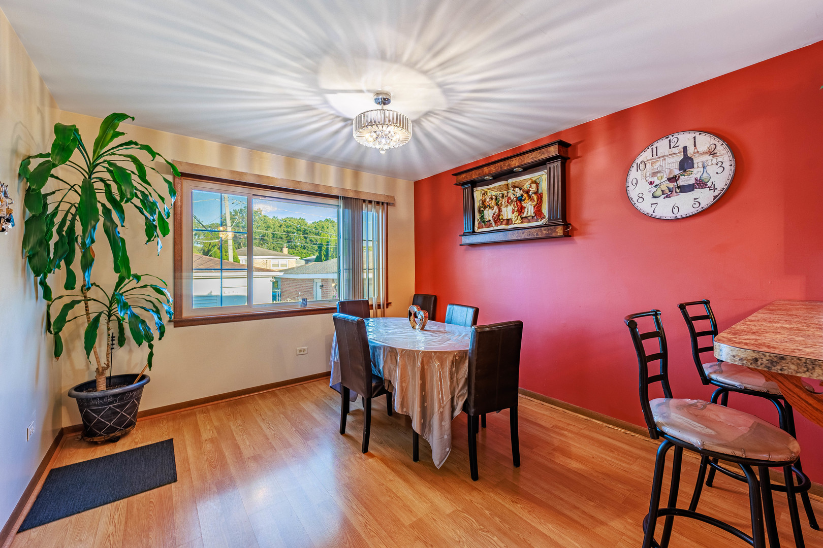 491 Escanaba Avenue Calumet City, IL 60409 - Photo 19 of 43 a view of a dining room with furniture window and wooden floor
