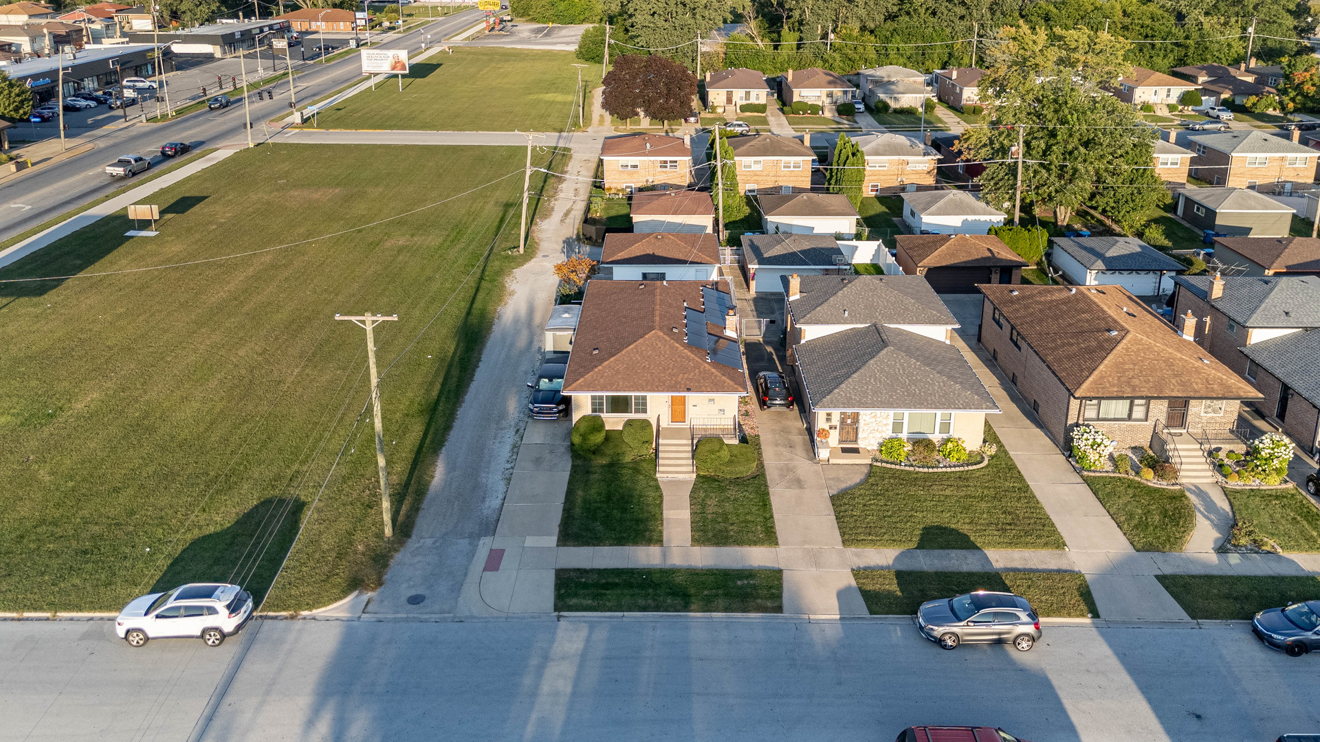 491 Escanaba Avenue Calumet City, IL 60409 - Photo 2 of 43 an aerial view of residential houses with outdoor space