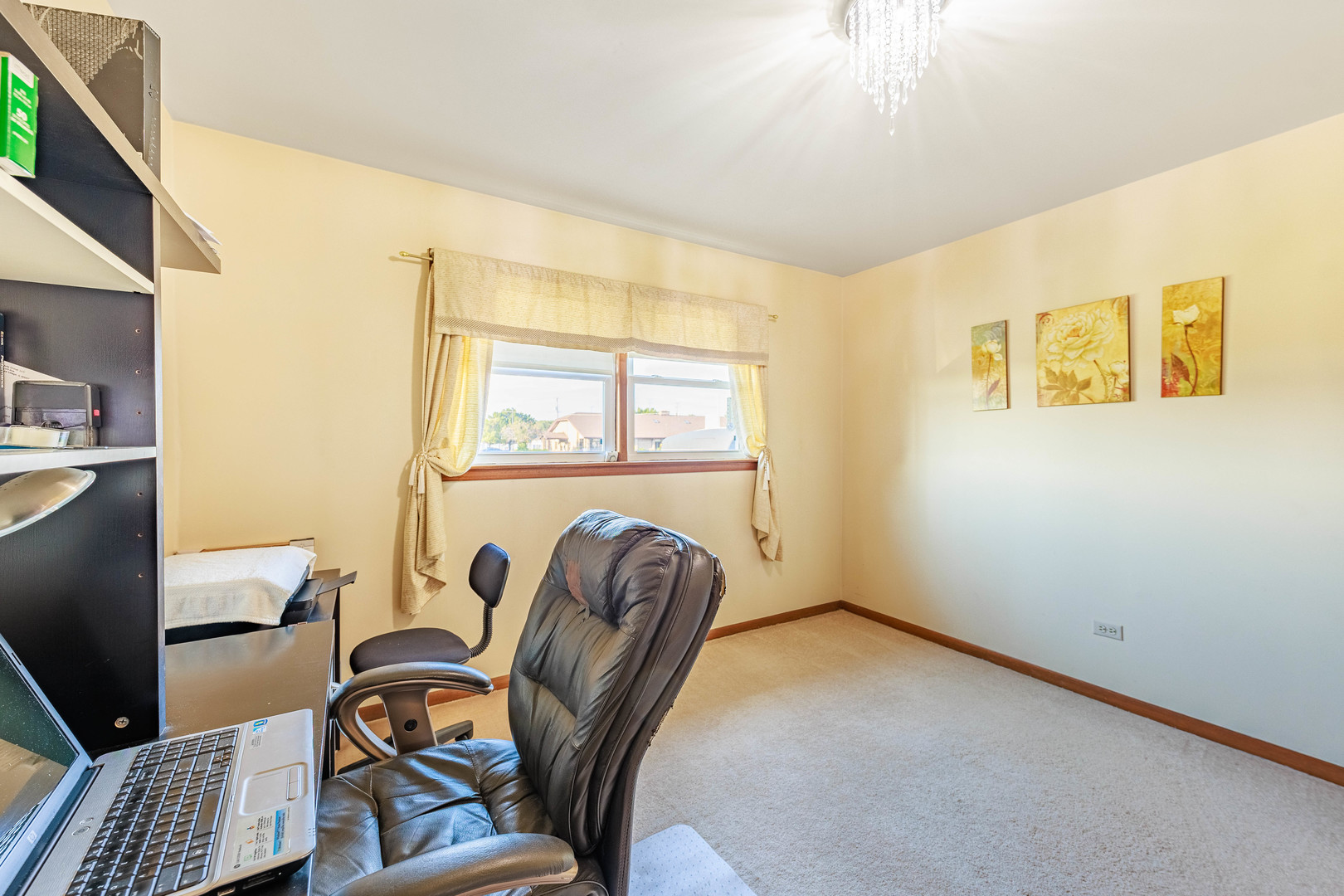 491 Escanaba Avenue Calumet City, IL 60409 - Photo 24 of 43 a view of a livingroom with furniture wooden floor and a window