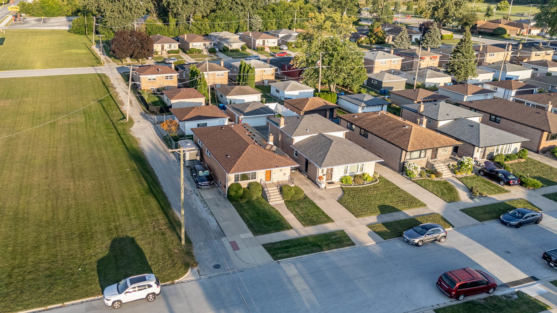 491 Escanaba Avenue Calumet City, IL 60409 - Photo 3 of 43 an aerial view of residential houses with outdoor space