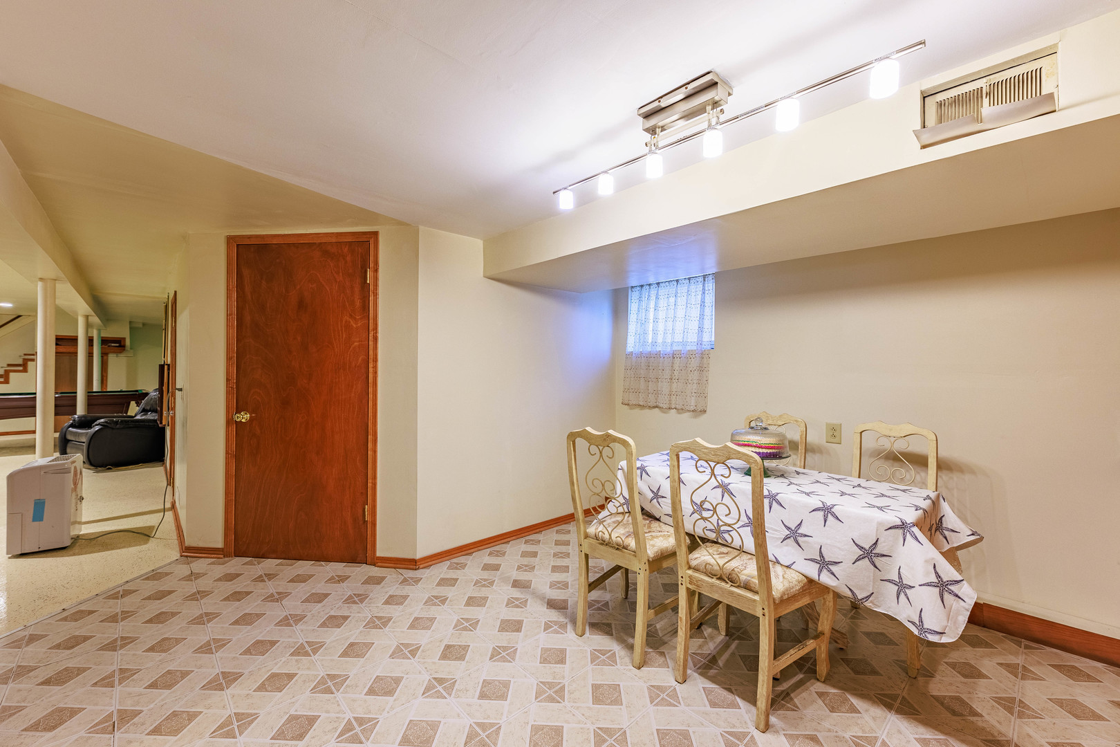 491 Escanaba Avenue Calumet City, IL 60409 - Photo 39 of 43 a view of a dining room with furniture and wooden floor