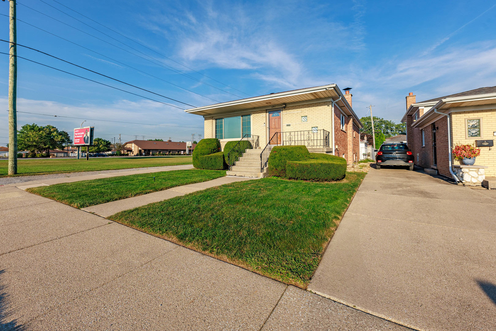 491 Escanaba Avenue Calumet City, IL 60409 - Photo 7 of 43 a view of a house with a yard
